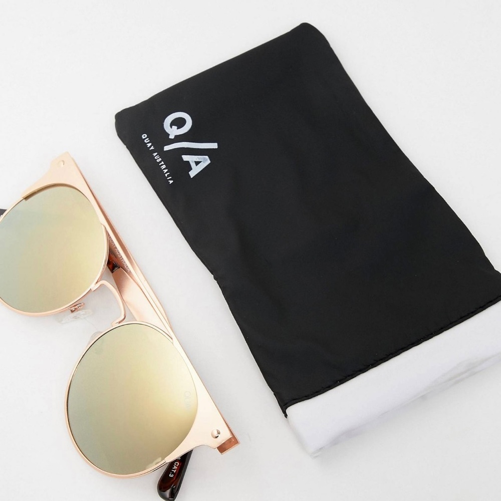 Quay Australia The In Crowd sunglasses. Gold frames with tan lenses.